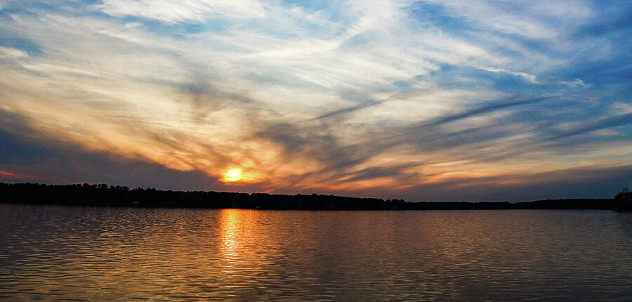 A Cloud Reacher Sunset Photograph by Ed Williams