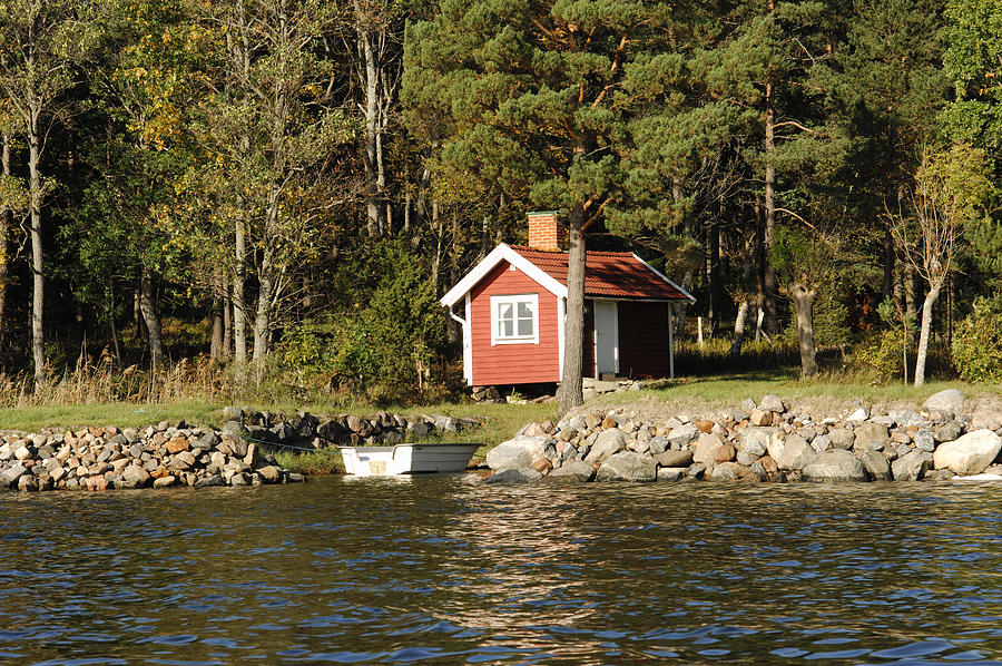 A cottage by the water Sweden. Photograph by Philip Laurell
