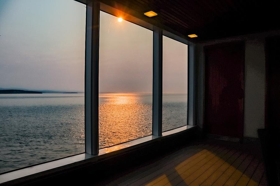 A Cruise Ship Window Sunset Photograph by Ed Williams
