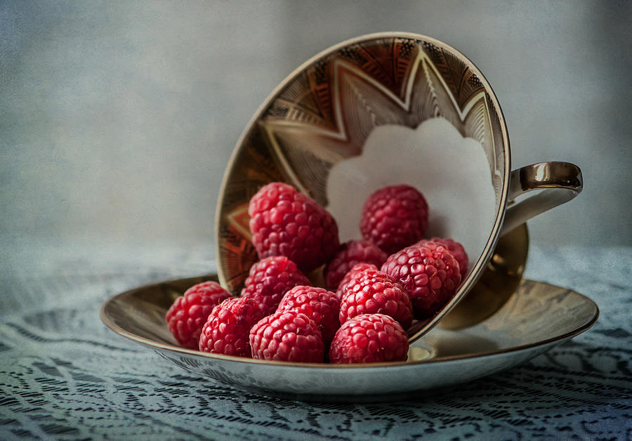 Raspberry Photograph - A cupfull of raspberries by Maggie Terlecki