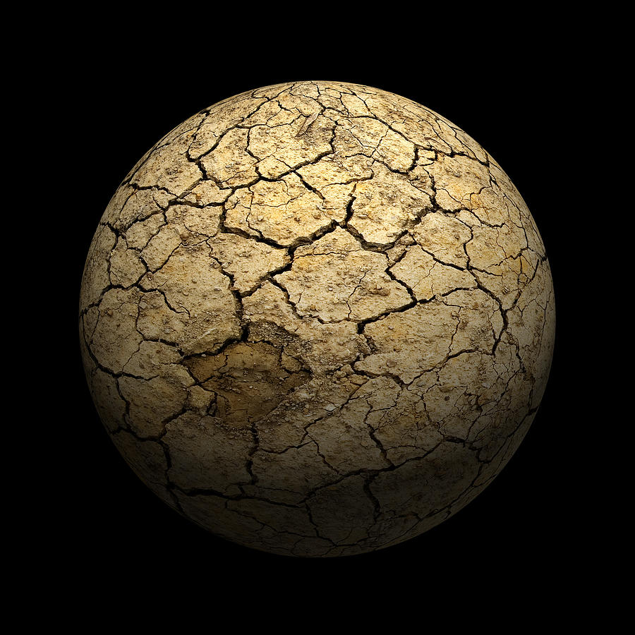 A dry cracked mud sphere on black background Photograph by Spod