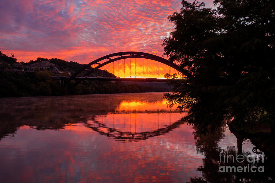 Sunset Photograph - A fiery sunrise greats the 360 Pennybacker Bridge as Steam rolls off Lake Austin by Dan Herron