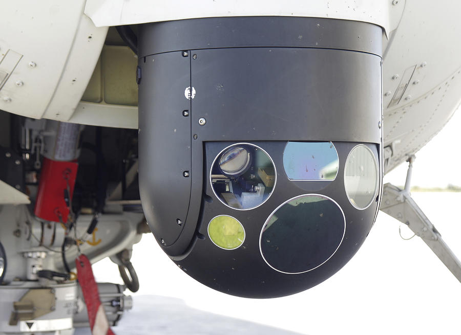 A Forward Looking Infrared (FLIR) camera, mounted on an EH101 utility helicopter. Photograph by Timm Ziegenthaler/Stocktrek Images