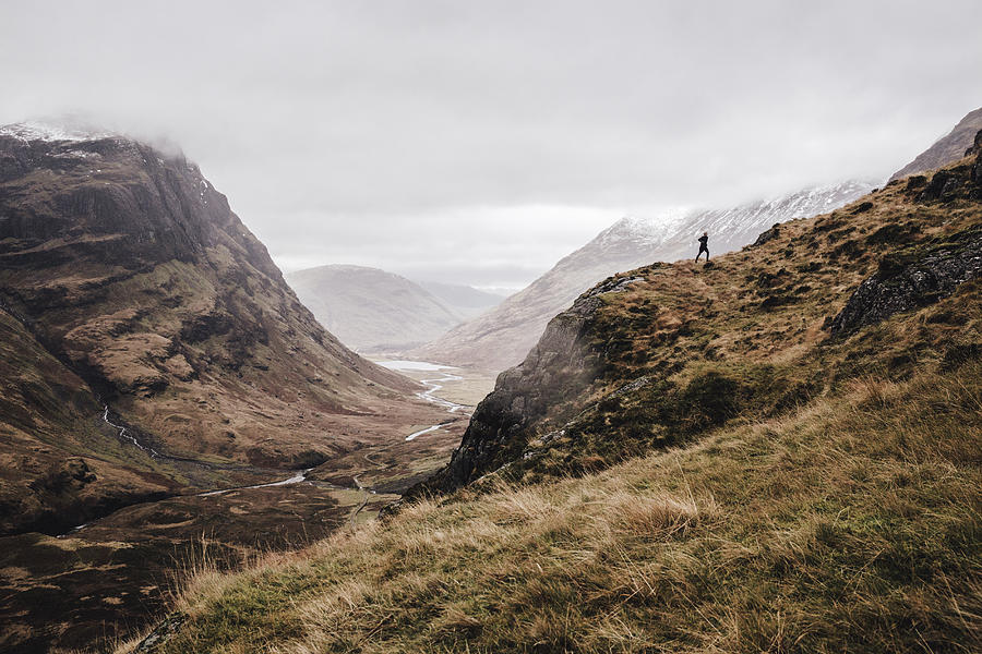 A free runner along a mountain landscape Photograph by Luca Sage