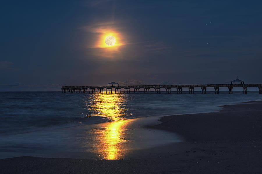 A Glimpse of Magic Full Moon Reflections at Juno Beach Pier Photograph by Kim Seng