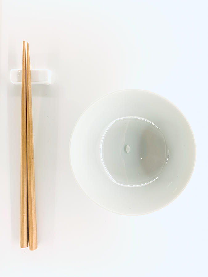 a grain Rice with Chopsticks Photograph by Liyao Xie