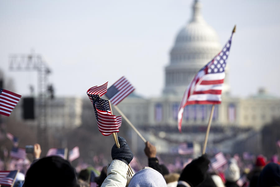 A grip of people holding flags in front of the White House Photograph by Carterdayne