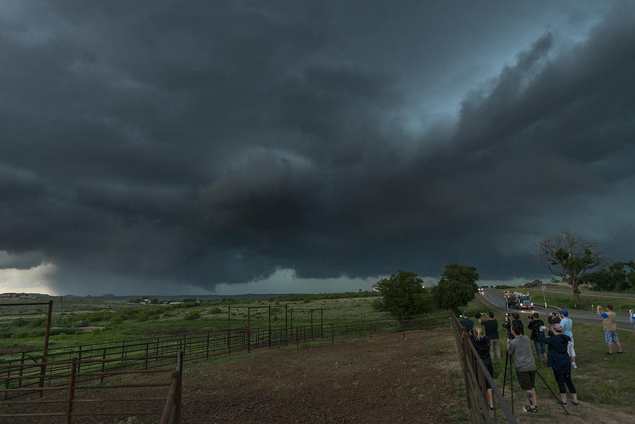 A group of storm chaser watch a Tornado over Northwestern Texas. USA Photograph by John Finney Photography