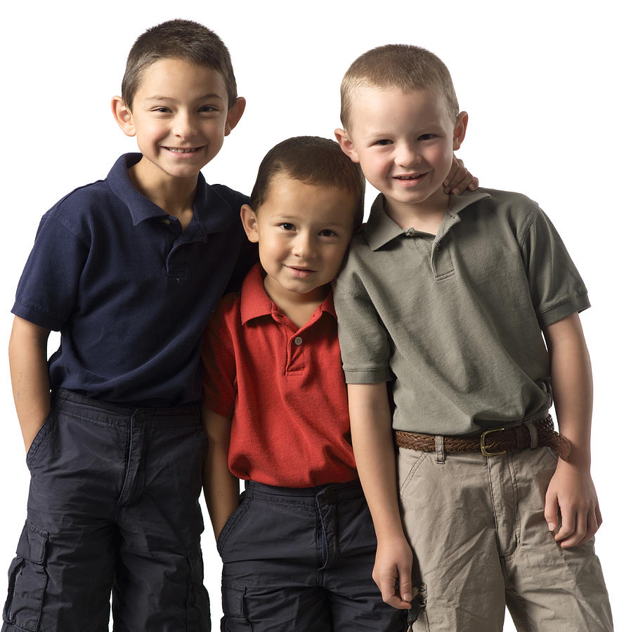 A Group Of Three Caucasian Child Brothers Put Their Arms Around Each Other And Smile At The Camera Photograph by Photodisc