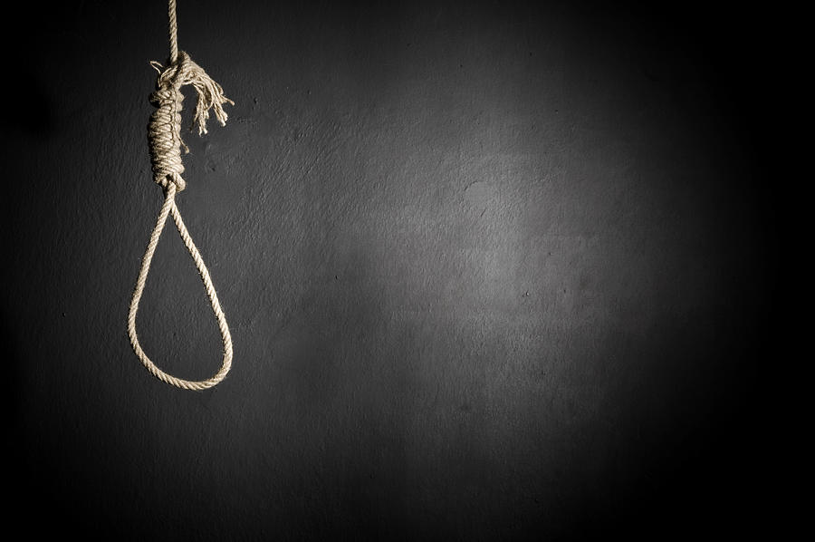 A hanging noose rope on black background Photograph by Volkankurt