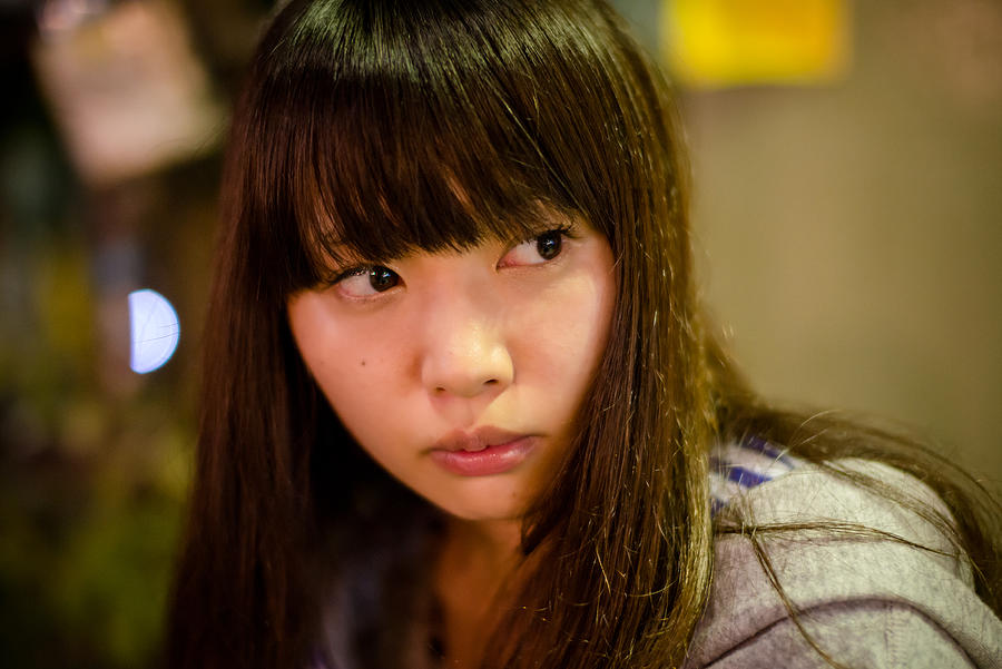 A Japanese Girl Looking Sideways Photograph by Takahiro Yamamoto