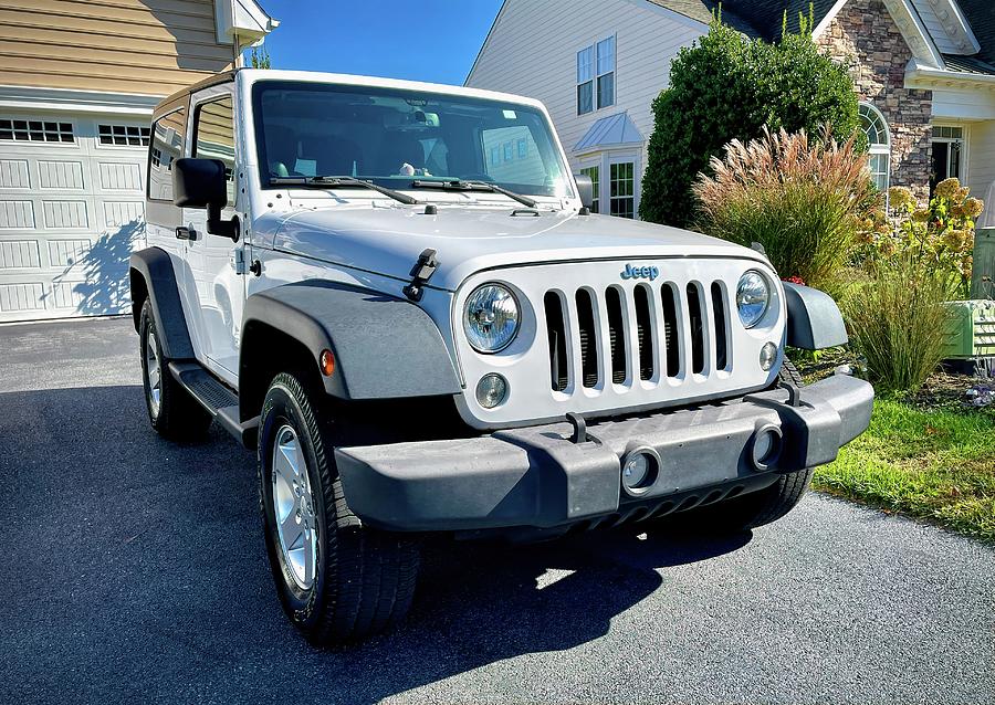 A Jeep in My Driveway Photograph by Bill Swartwout