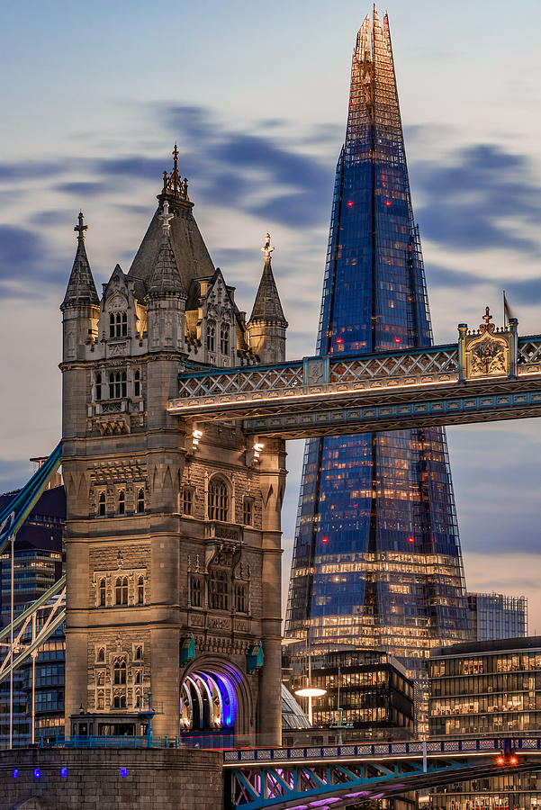 A juxtaposition between Tower bridge and The Shard Photograph by George Afostovremea