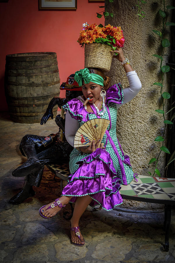 A Lady And Her Cigar And A Bottle of Rum Photograph by Mike Schaffner