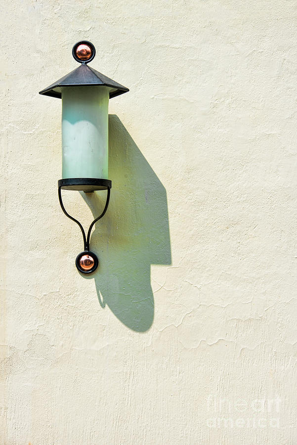 A Lonely Lamp And Its Shadow Photograph