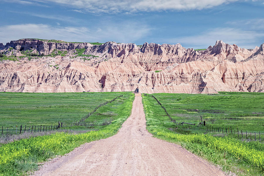 A Long Road in Badlands National Park South Dakota USA Photograph by Joan Carroll