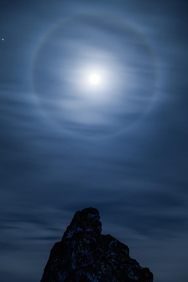 A Lunar Halo Above The Rocks Photograph by Isogawyi