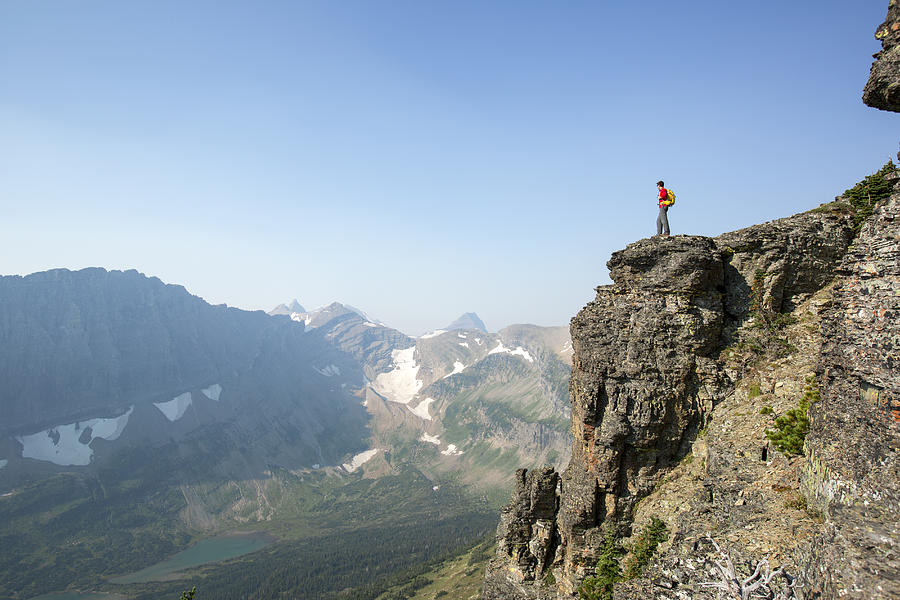 A male backpacking in the mountains. Photograph by Jordan Siemens