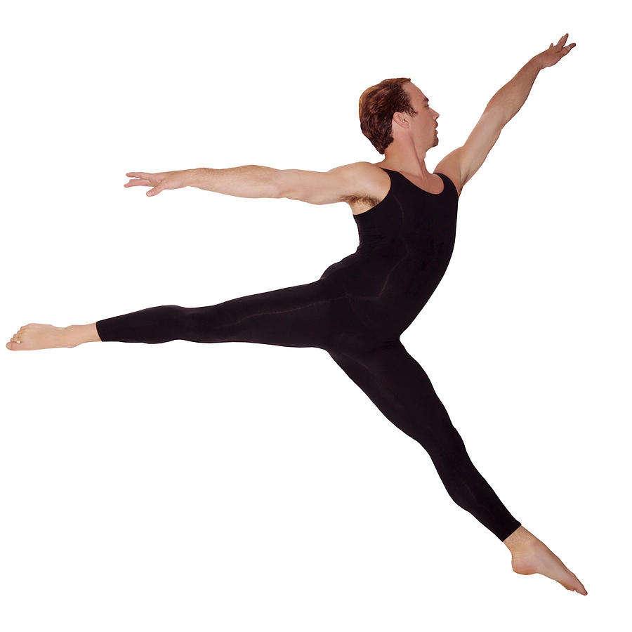 A male ballet dancer does a grand jete? in an arabasque position, side view., Photograph by Thinkstock