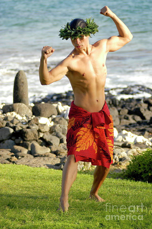 A masculine male hula dancer exhibits his manly hula style.	 Photograph by Gunther Allen