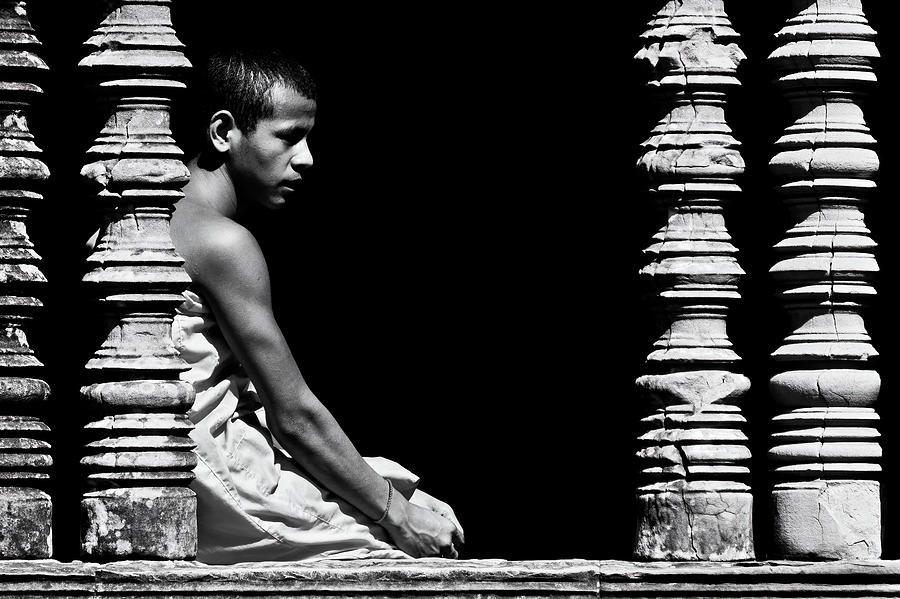 A monk at The window. Angkor Wat. Cambodia Photograph by Lie Yim