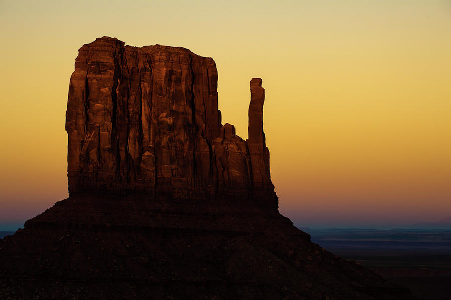 Sunset Photograph - A Monument of Stone - Monument Valley Tribal Park by Gregory Ballos