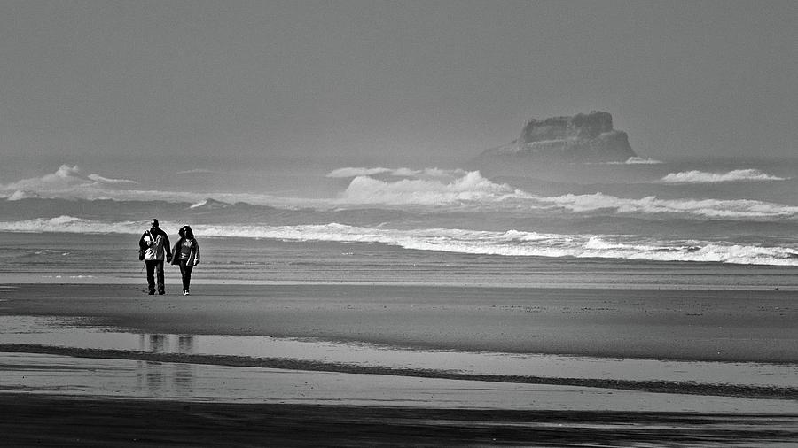 A morning stroll on the beach Photograph by Loren Gilbert