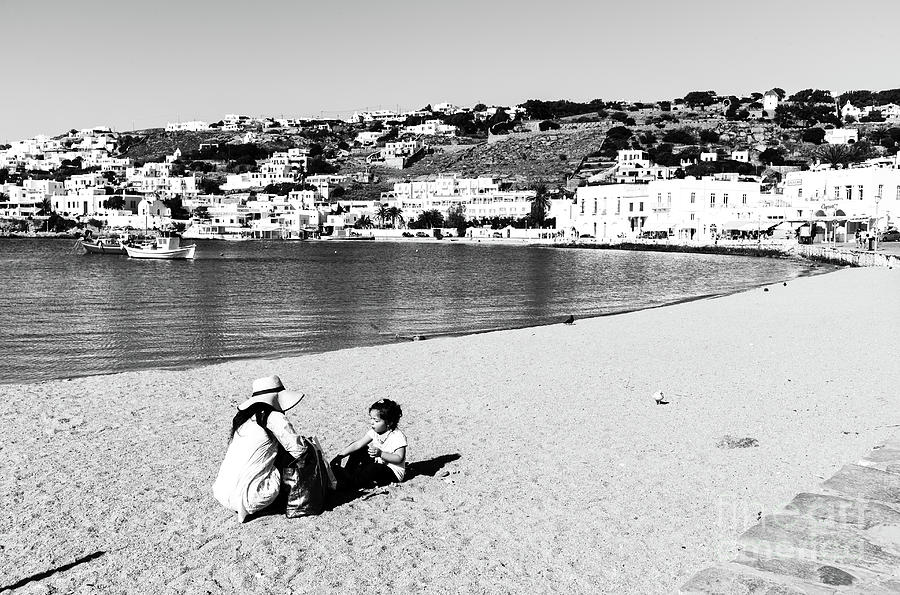 A Mother and Child at the Beach in Mykonos Photograph by John Rizzuto