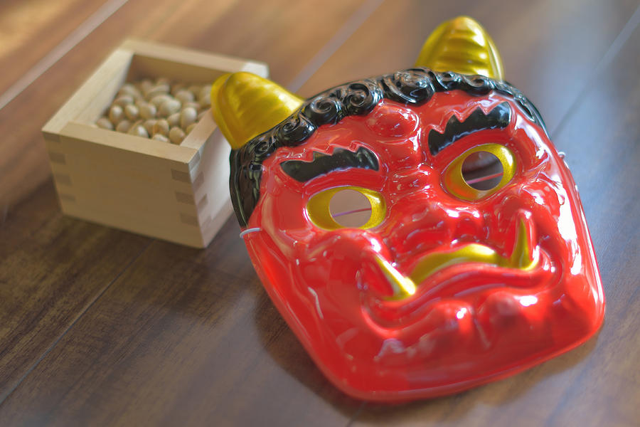 A ogre mask and soybeans for Setsubn Photograph by Photo by Kosei Saito