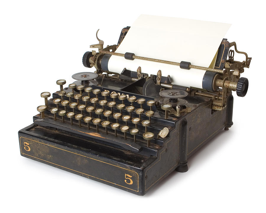 A old antique typewriter with blank paper Photograph by TokenPhoto