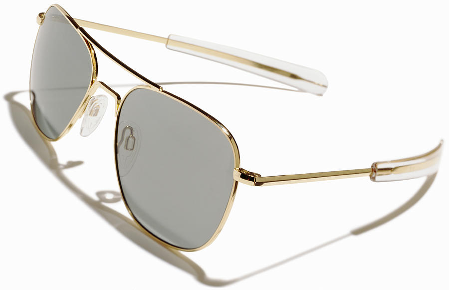 A pair of gold rimmed aviator sunglasses Photograph by Steve Wisbauer