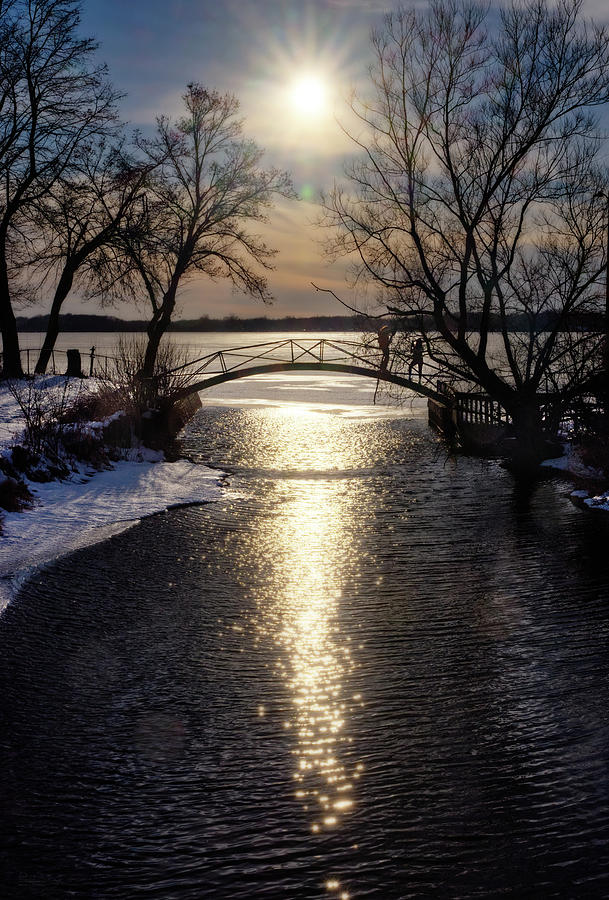 A Perfect Day -  Sunset behind Arch Bridge at Bartel Beach  at Lake Mills Wisconsin Photograph by Peter Herman