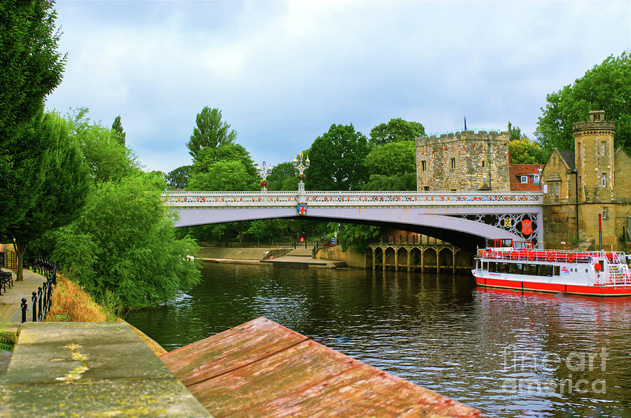 A picture of a pleasure boat moored on the River Ouse York UK Photograph by Pics By Tony