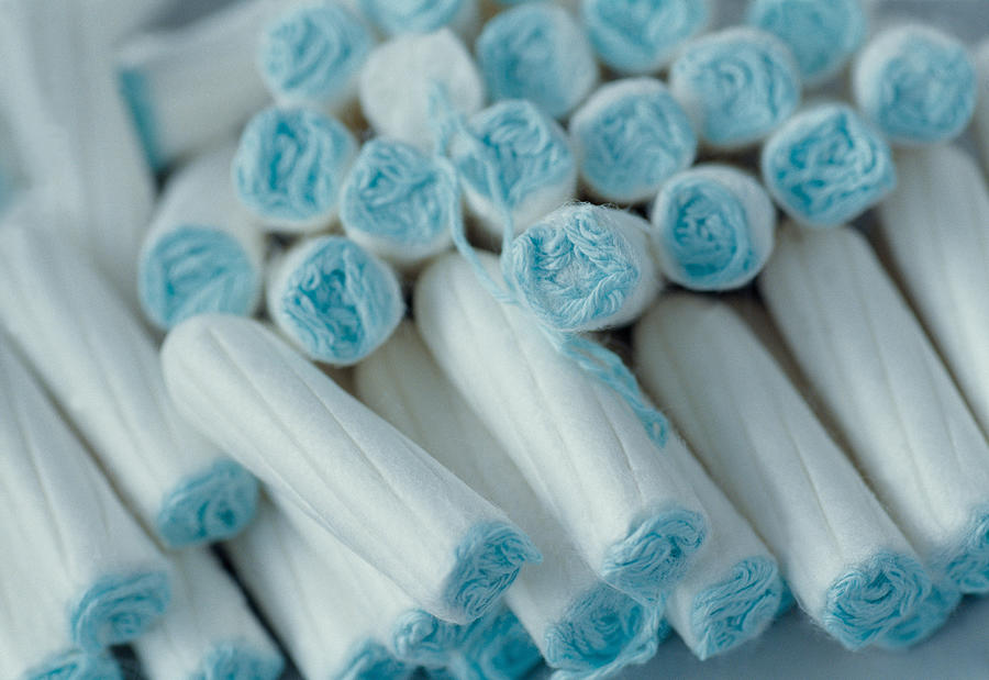 A pile of tampons Photograph by Image Source