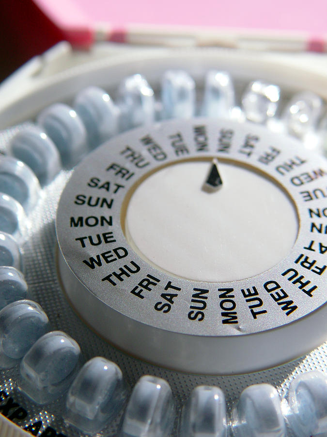 A pill organiser with days of the week Photograph by Sandoclr