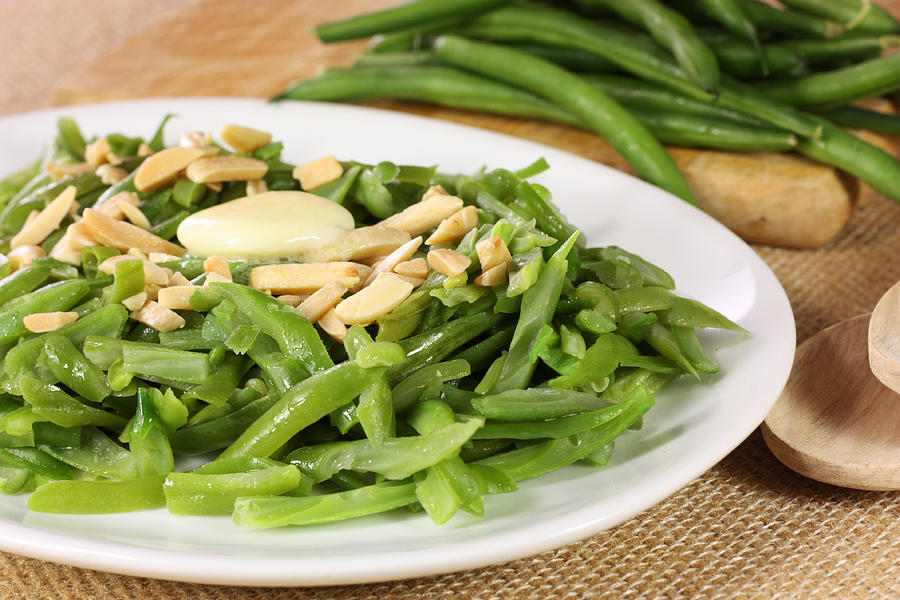 A plate of green beans and almonds Photograph by Wsmahar
