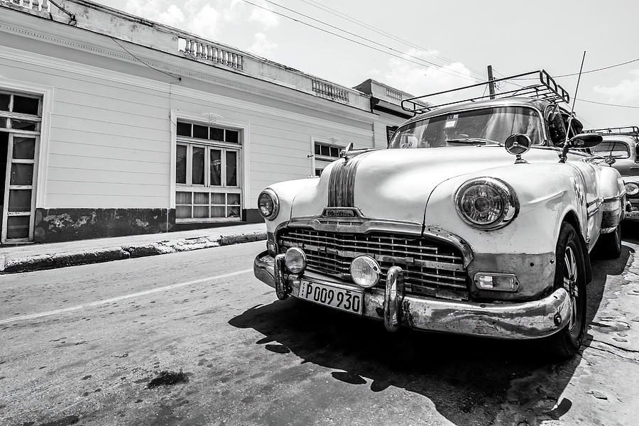 A Pontiac on Cienfuegos. Cuba. Photograph by Lie Yim