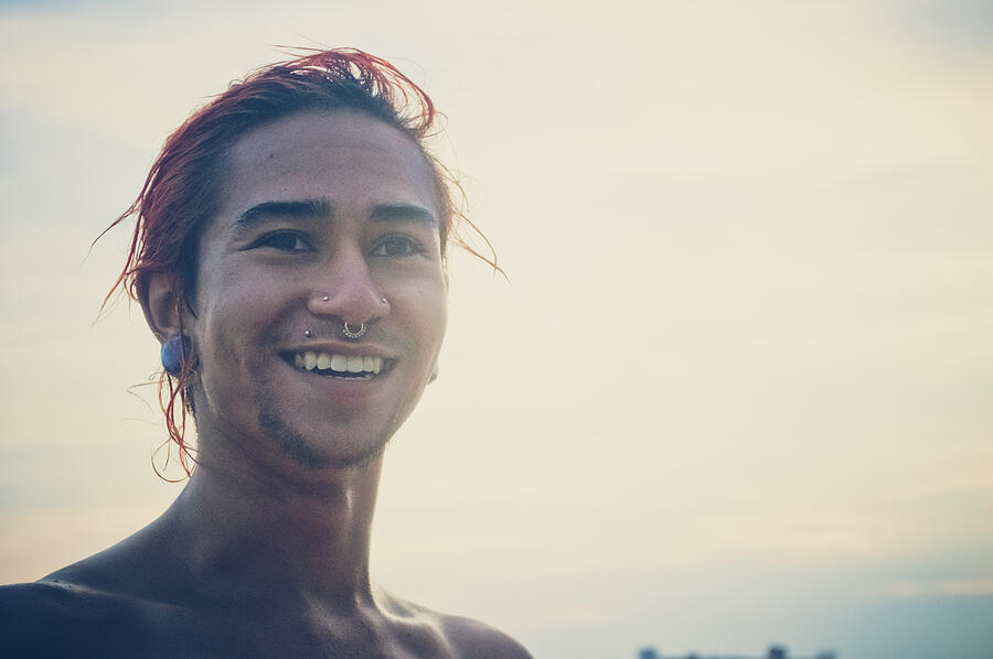 A portrait of a young man at the beach. Photograph by Fran Polito