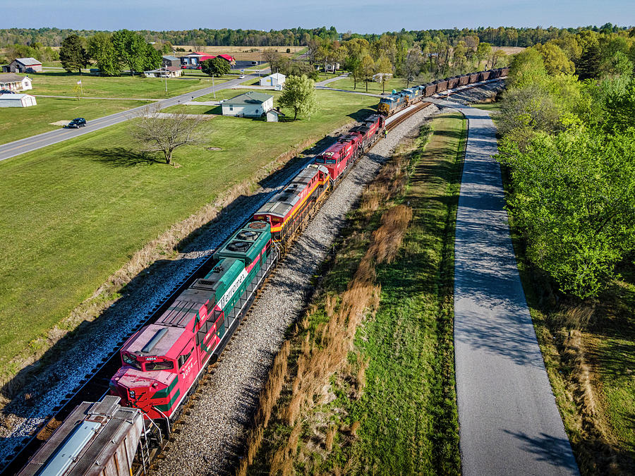 A rainbow of power waits at Kelly KY for a loaded coal to pass Photograph by Jim Pearson