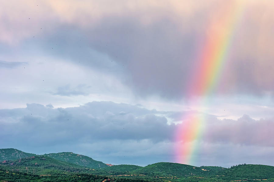 A Rainbow Over The Hills Photograph by Alexios Ntounas