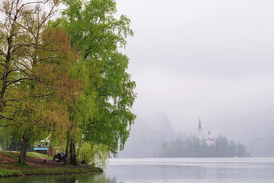 A rainy day in Bled, Slovenia Photograph by Mirko Chessari