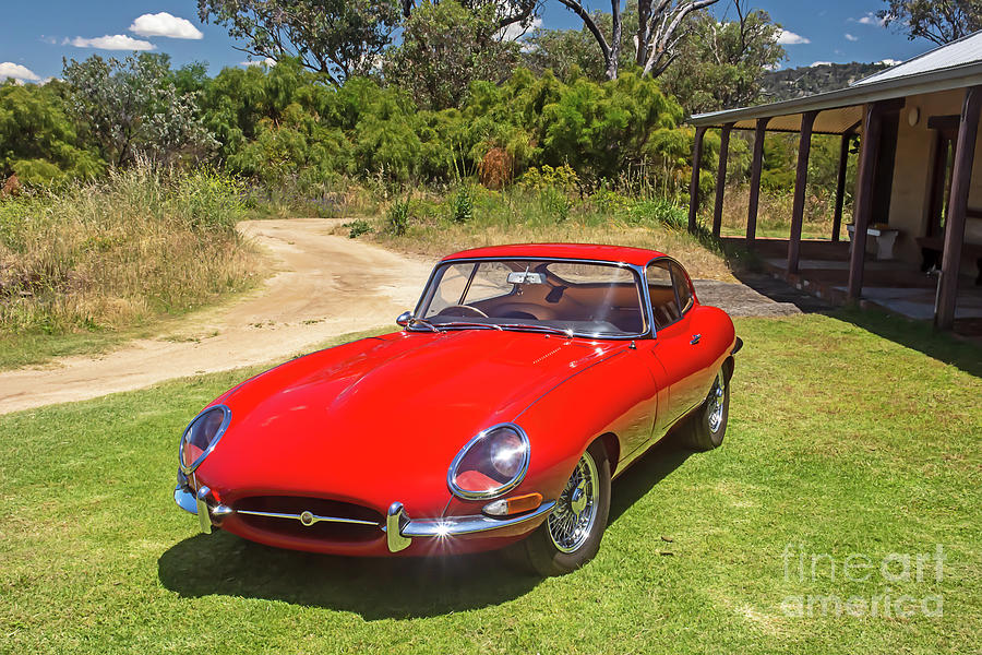 Vintage Photograph - A red 1962 Jaguar E Type FHC Sports car. E3  by Christopher Edmunds