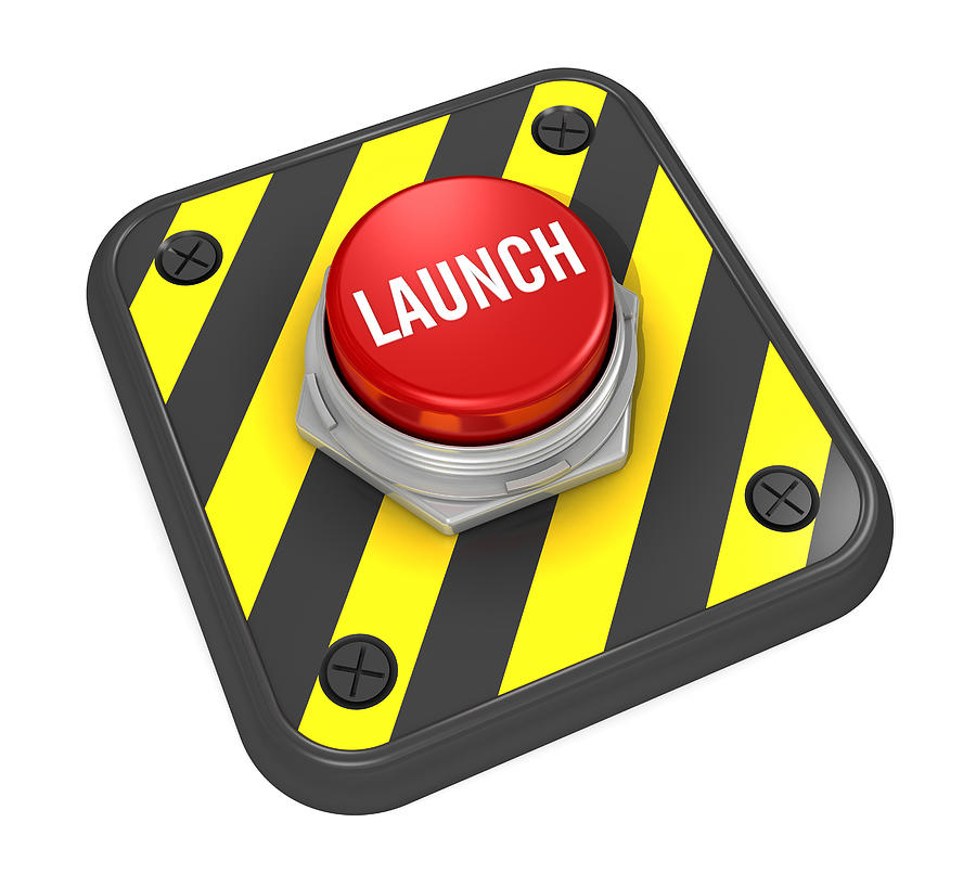 A red hazard launch button in bright white letters Photograph by ZargonDesign