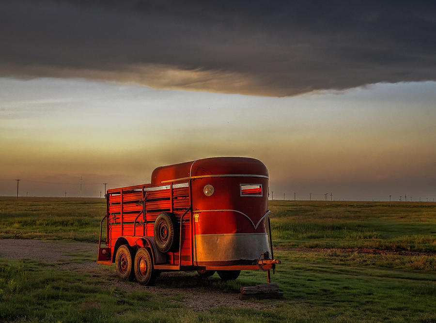 A Red Horse Trailer at Sunset in Texas Photograph by Laura Hedien