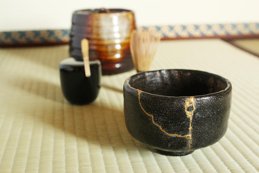 A repair of crack pottery tea cup  at Japanese tea room Photograph by Riya-takahashi