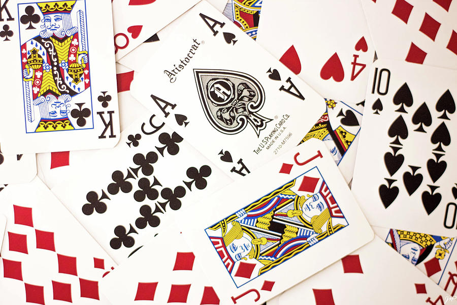 Create an artistic representation of a royal flush, the highest-ranking  hand in poker, using vibrant colors and intricate details. showcase the  five cards (ace, king, queen, jack, and ten) from a single