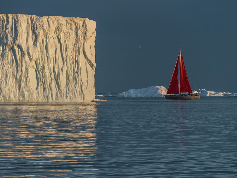 A sailboat and an ice wall Photograph by Anges Van der Logt