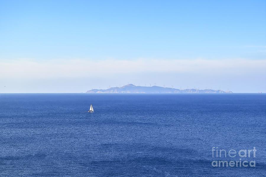 A sailboat on the Mediterranean Sea, as viewed from Cape Sounion, Attica, Greece Photograph by William Kuta