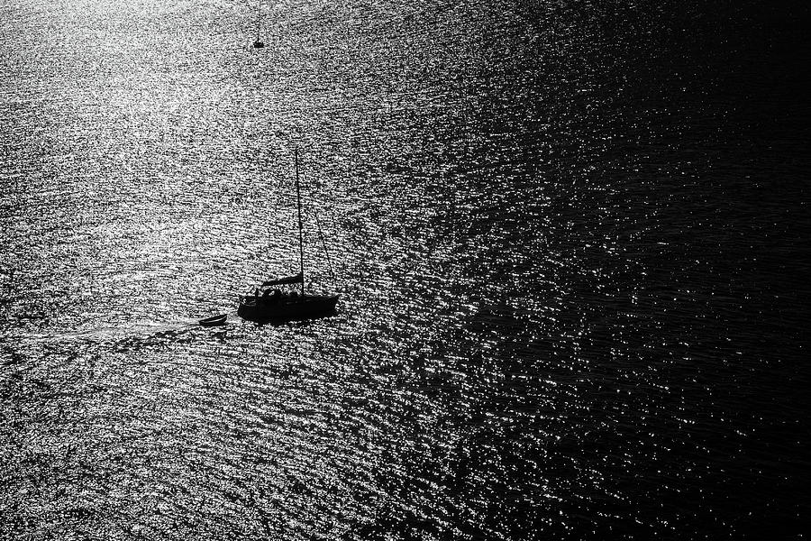 A sailing boat passes heads out from St Mawes Photograph by Seeables Visual Arts