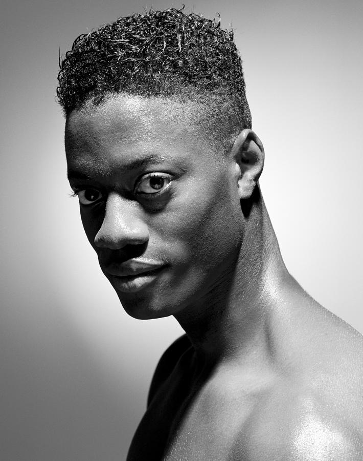 A Side Profile Of A Bare-chested African American Young Man Photograph by Photodisc
